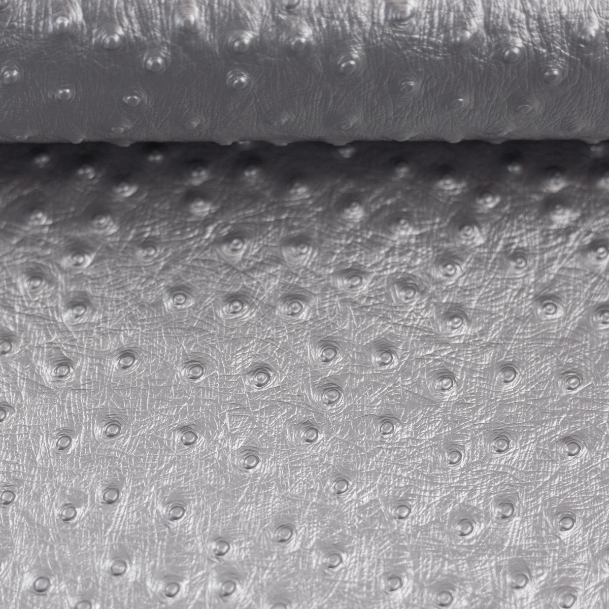 Kunstleder genoppt silber metallic